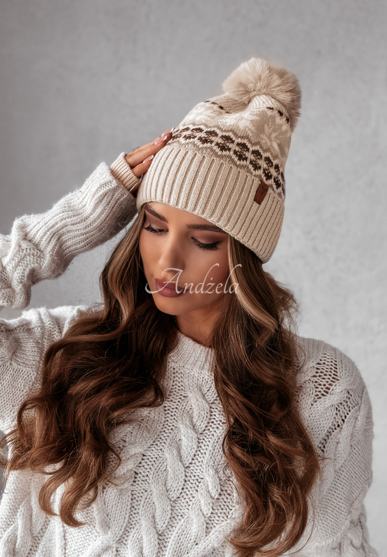 Gemusterte Mütze mit Bommel Snowman Factory Beige