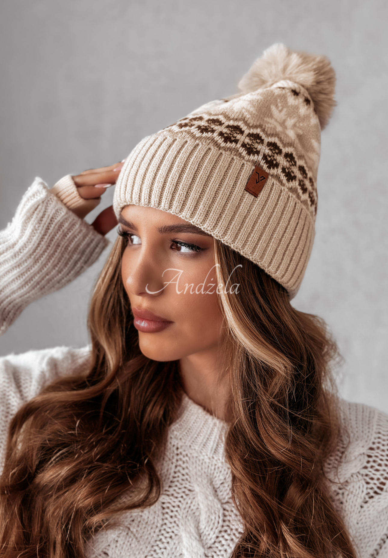 Gemusterte Mütze mit Bommel Snowman Factory Beige