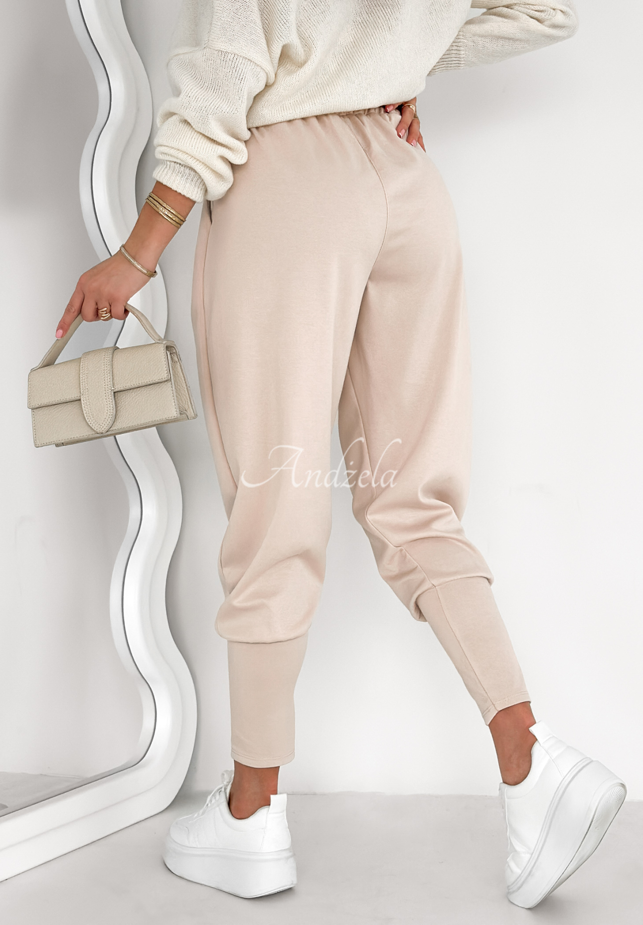 The First Try light beige fabric butter pants