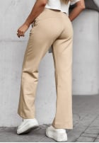 Material Hose dzwony Can't Ignore Me Hell Beige