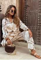 Satynowe spodnie wide leg we wzory Girls Gone Wild jasnobeżowe