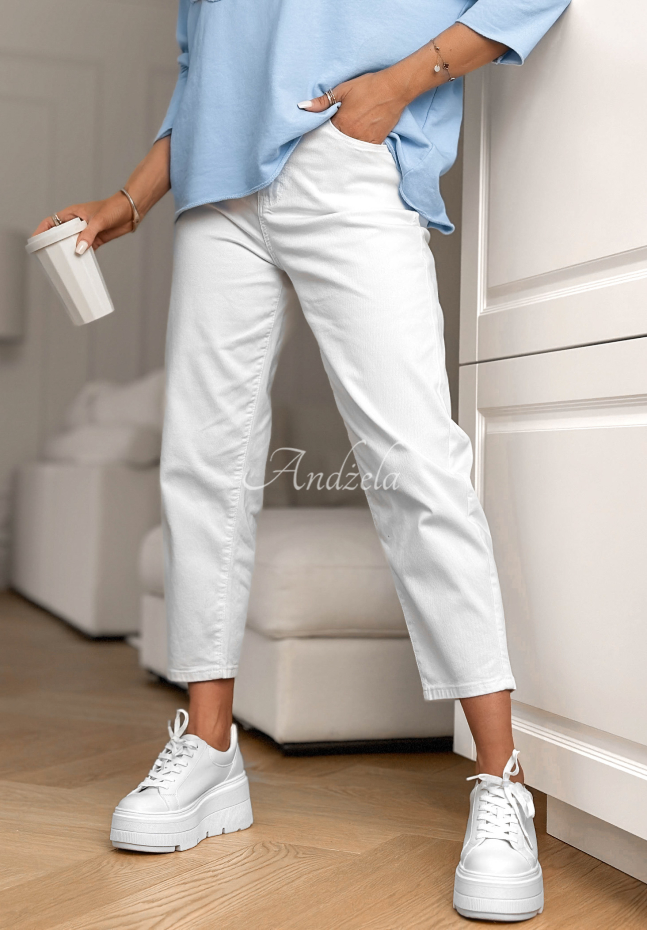 Mom fit jeans with Know Nothing belt, white