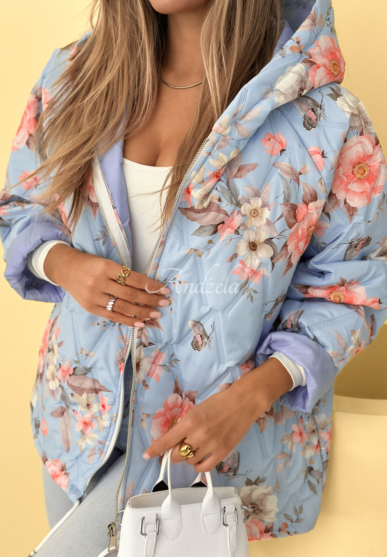 Kurze Steppjacke mit Kapuze und Blumenmuster Begonia Himmelblau