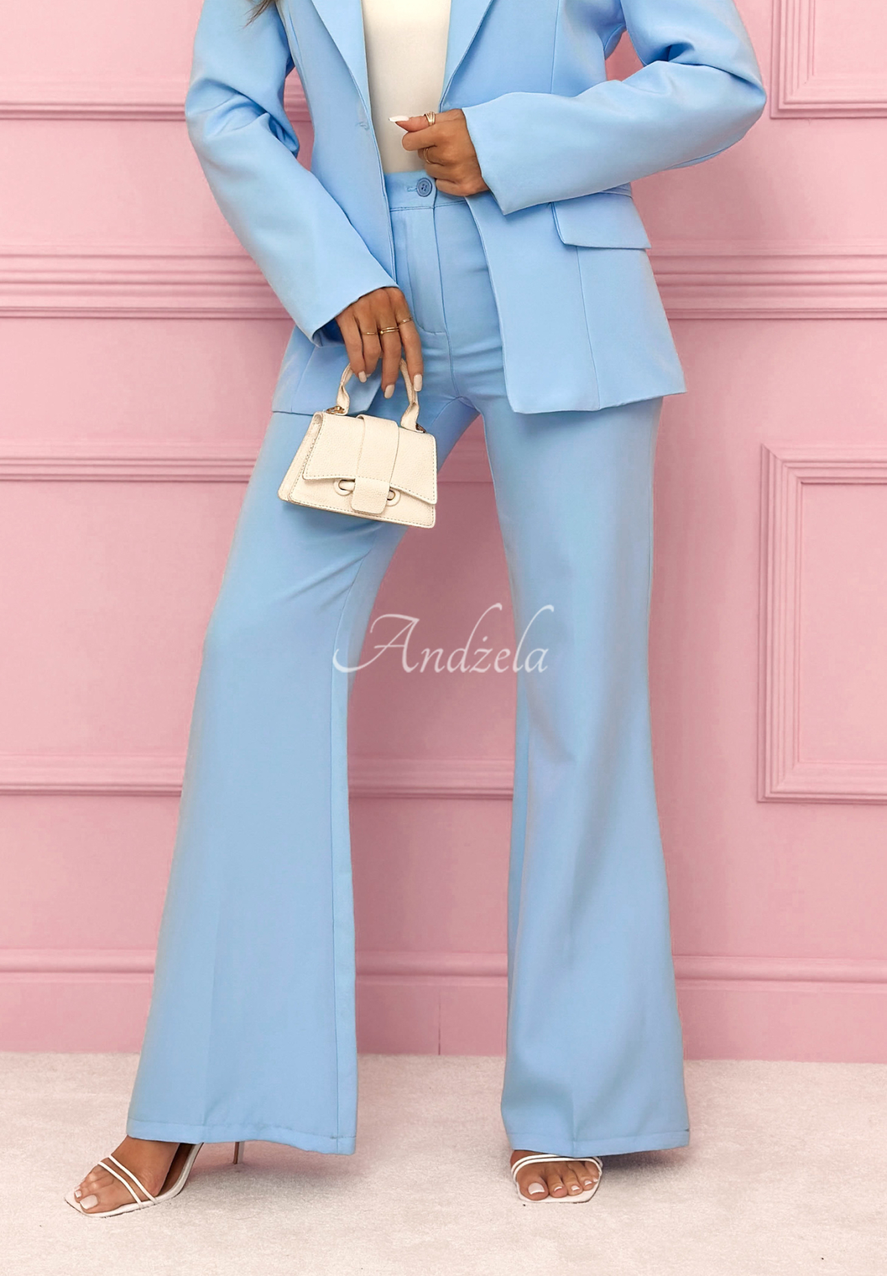 Fitted women's suit with flared legs Coctail Party light blue