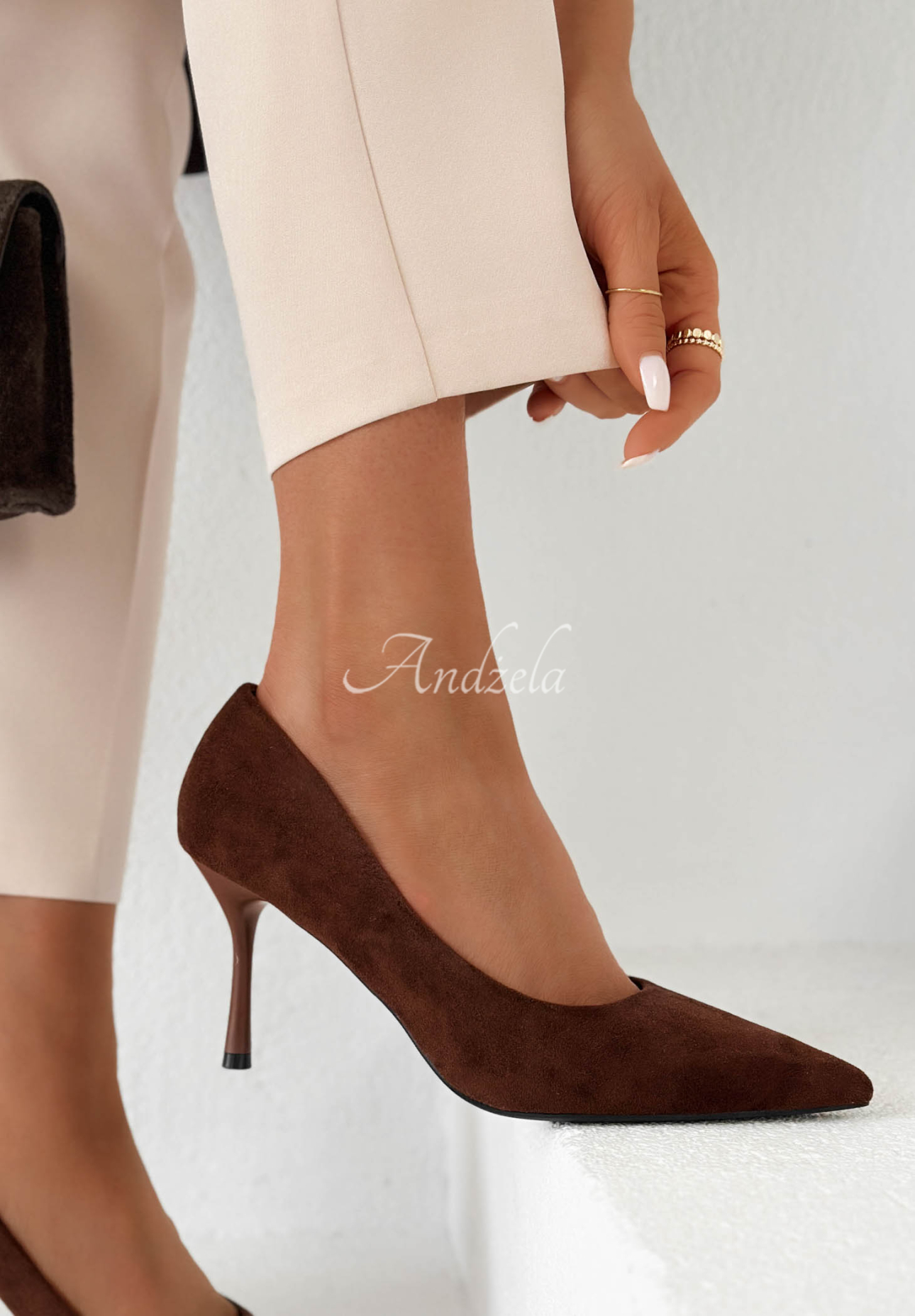 Eloise chocolate-colored suede pointed-toe stilettos
