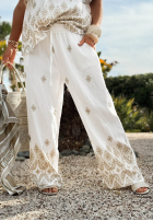 Material Hose wide leg Mit Muster Sunset Paradise biało-Beige