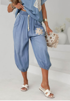 Material Hose joggery z naszywką Sunset Palm Blau