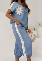 Material Hose joggery z naszywką Sunset Palm Blau