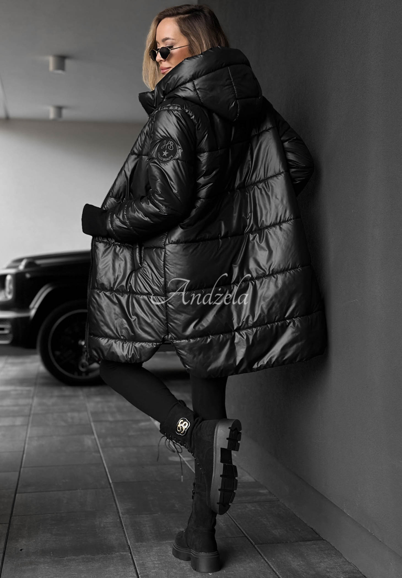 Lange, gesteppte Jacke mit Kapuze Cinnamon Latte Schwarz