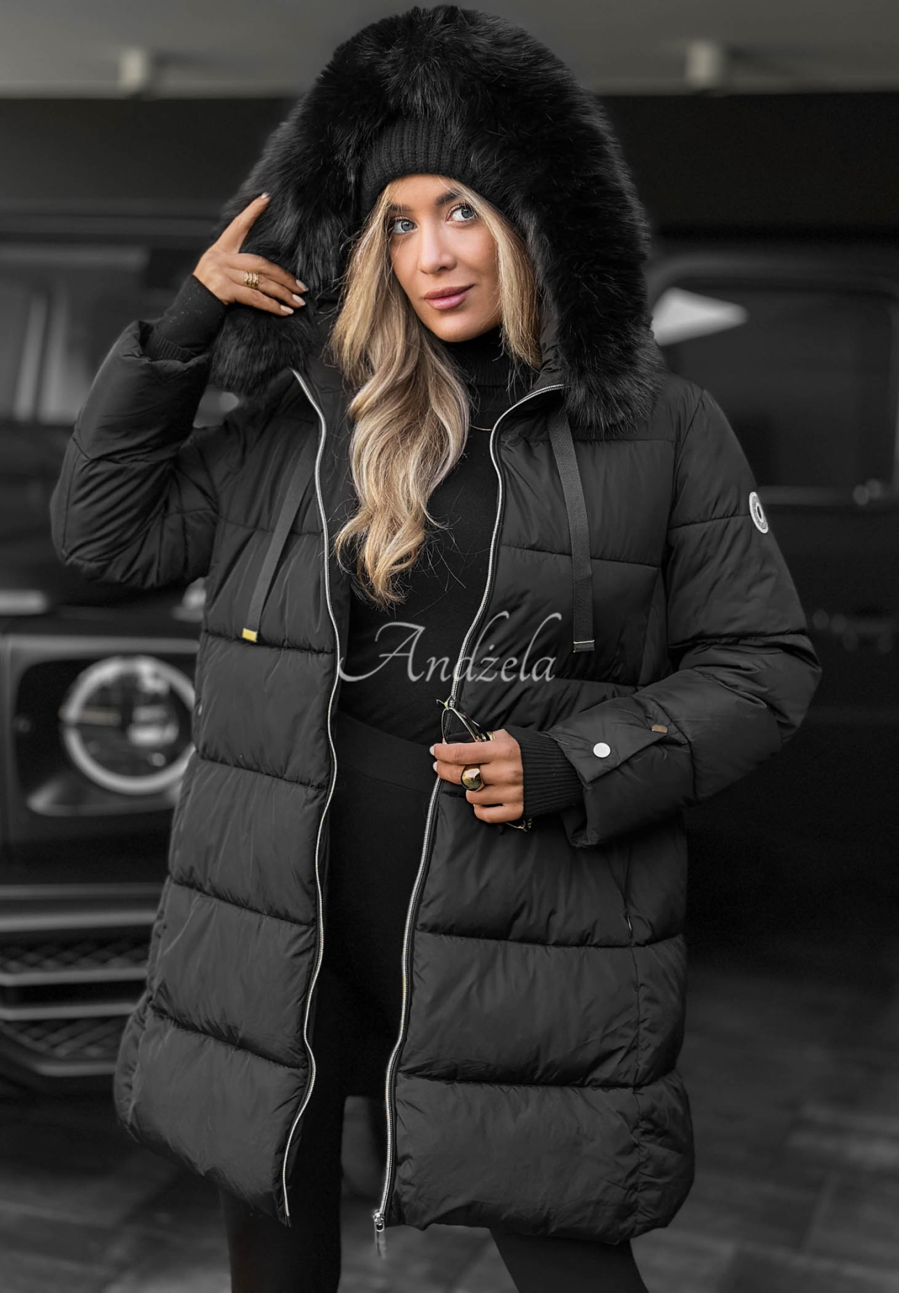 Lange, gesteppte Jacke mit Fellimitat Winter Sunday Schwarz