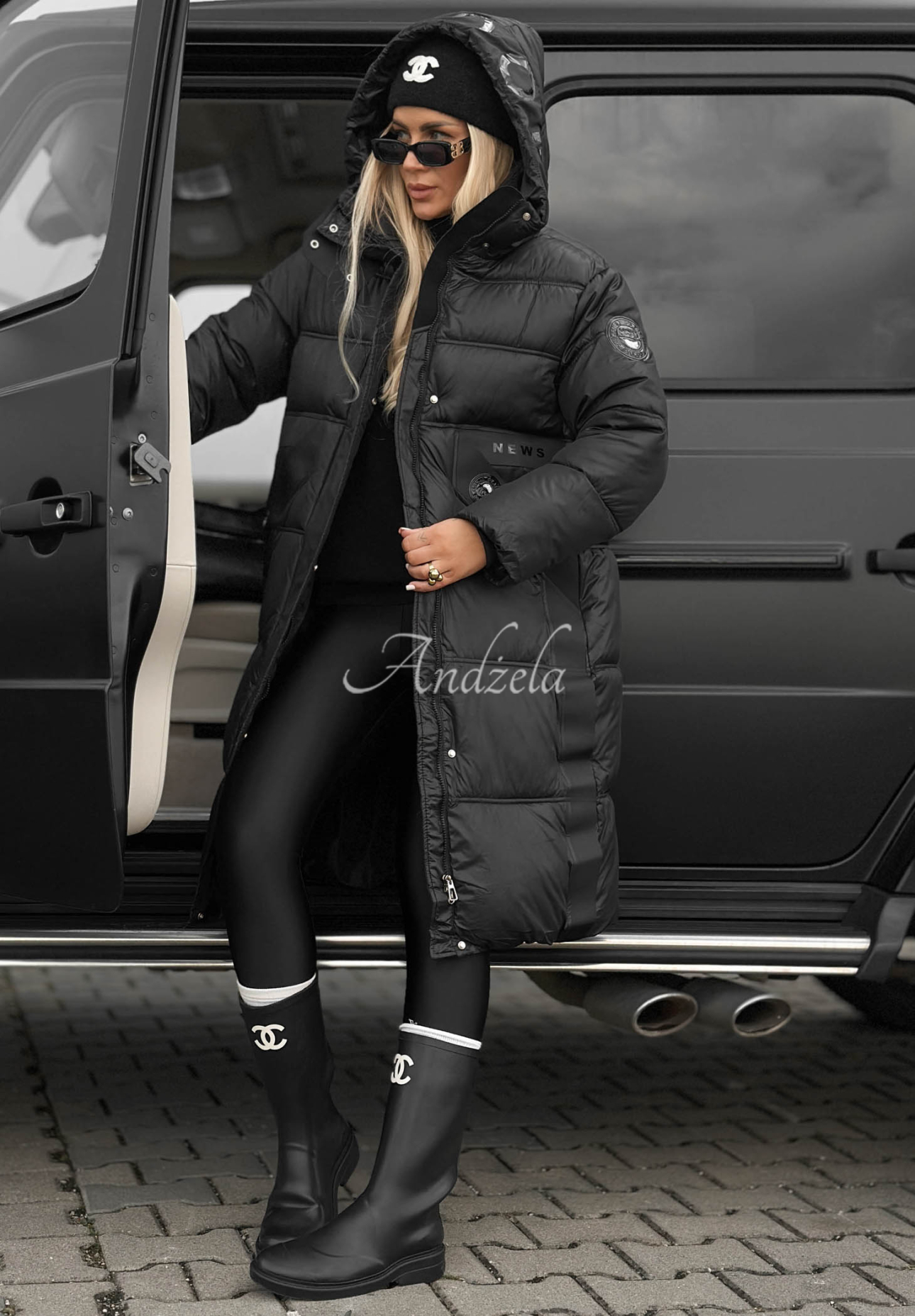 Lange, gesteppte Jacke mit Kapuze Forest Essence Schwarz