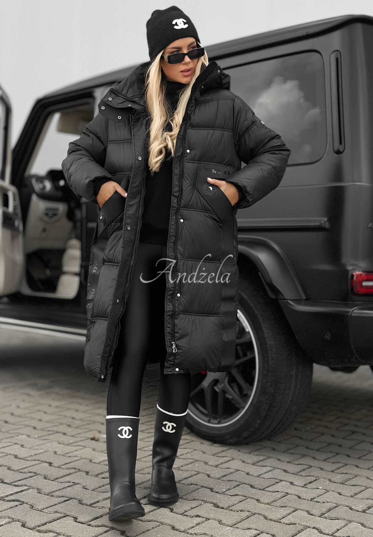 Lange, gesteppte Jacke mit Kapuze Forest Essence Schwarz
